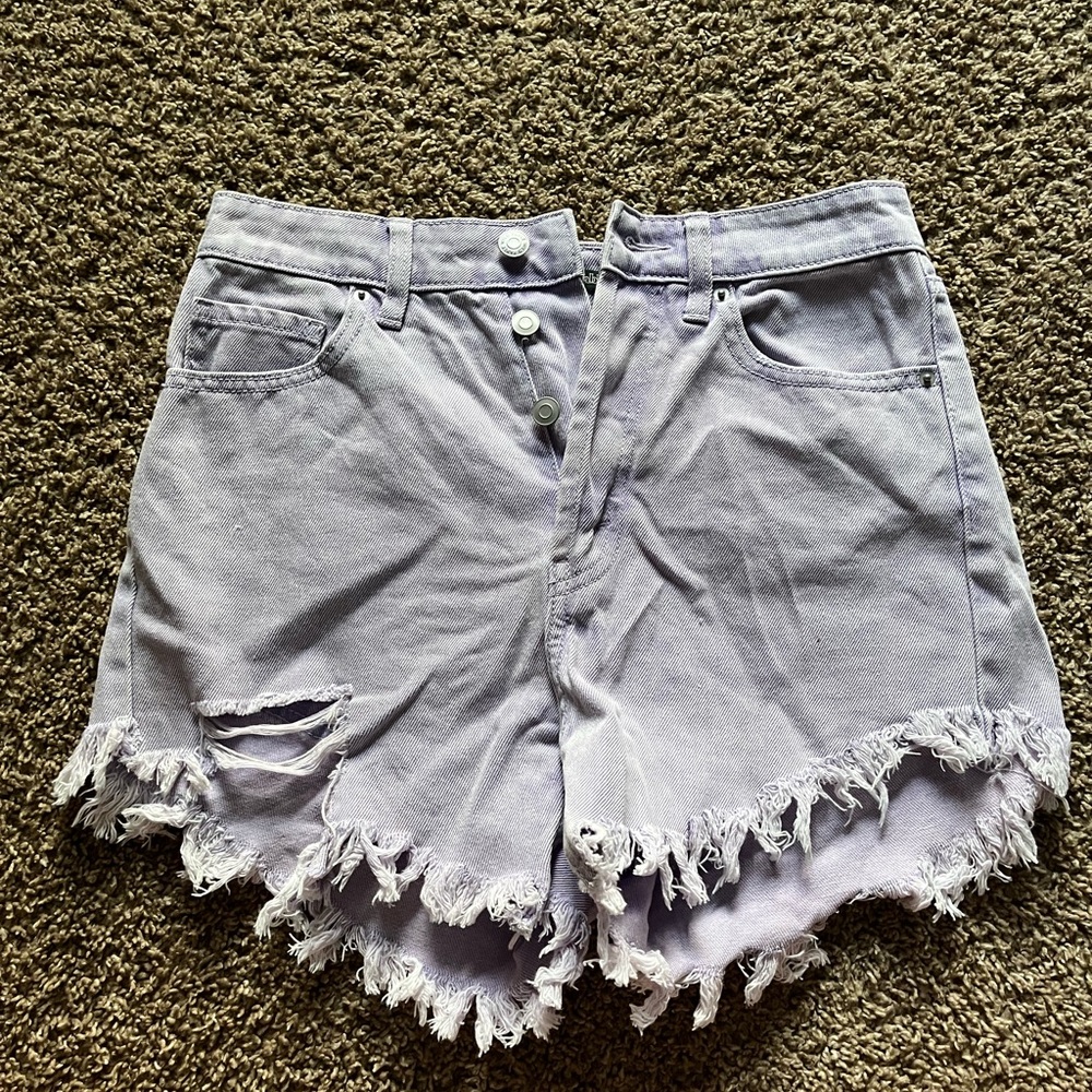 purple ripped jean shorts